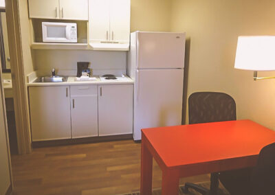 Emerald Suites Valley View | Extended Stay Apartment Rentals in Las Vegas, NV | Furnished Suites, Contemporary Kitchens with Cooktops, and a Comfortable Place to Eat or Work
